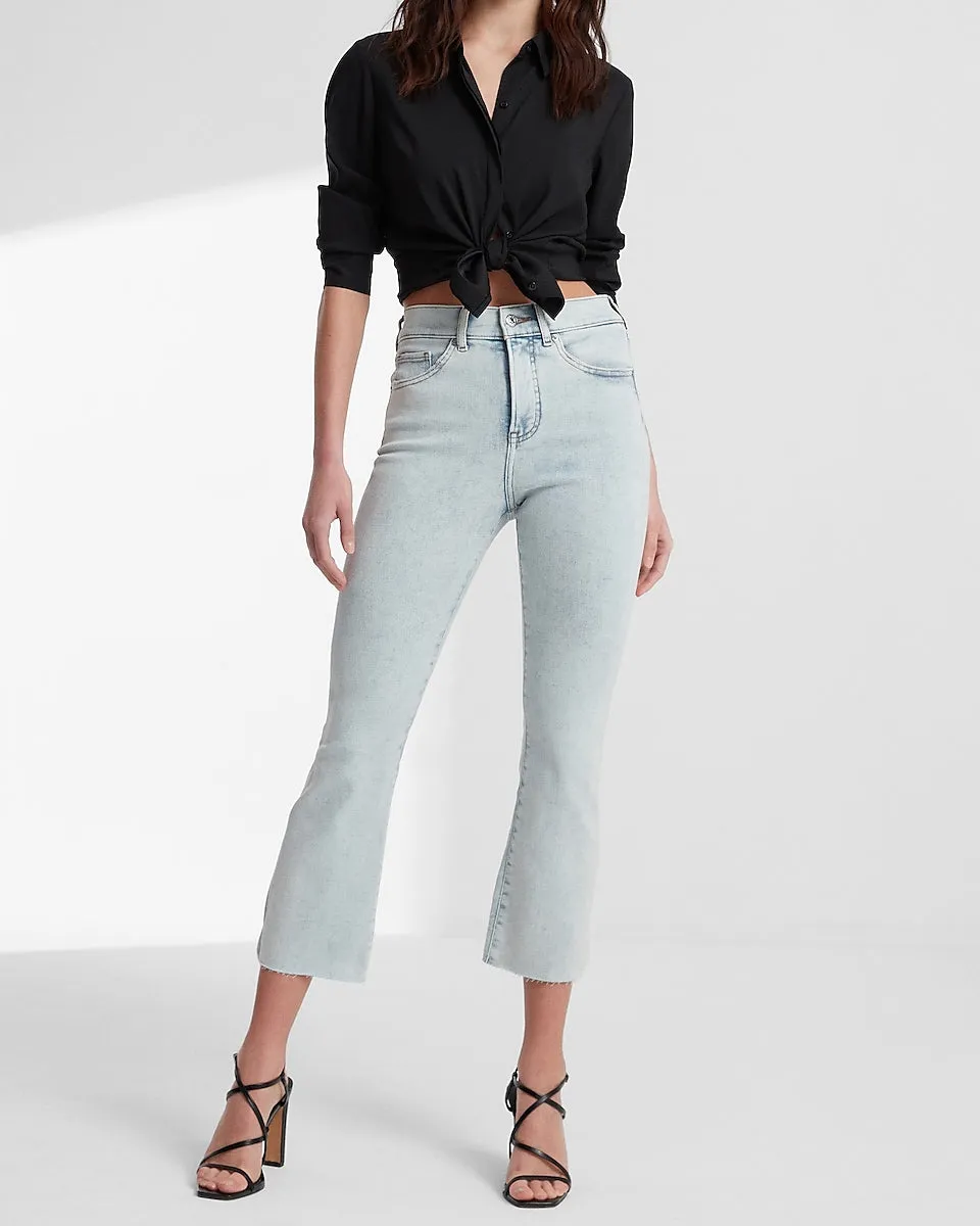 High Waisted Light Wash Raw Hem Cropped Flare Jeans in Light Wash