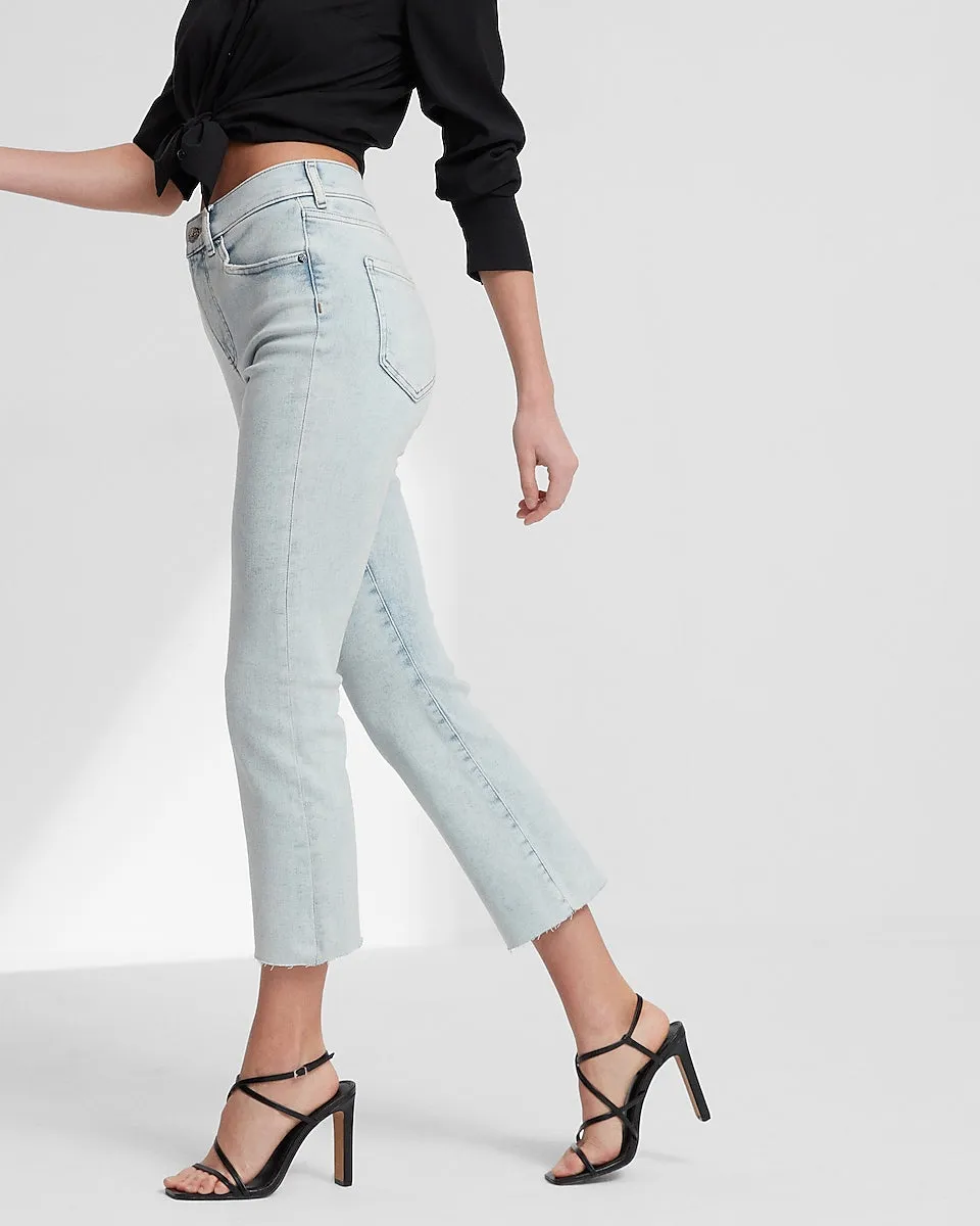 High Waisted Light Wash Raw Hem Cropped Flare Jeans in Light Wash