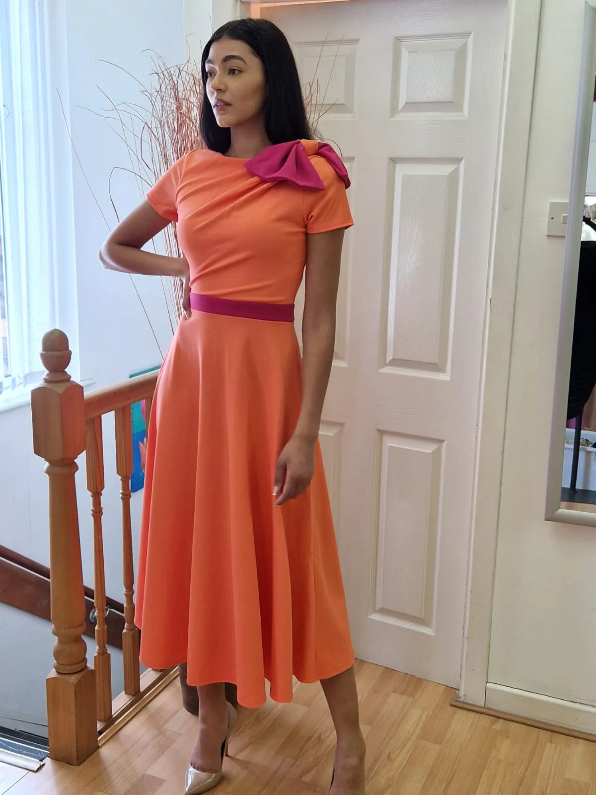 Kate Bow shoulder tea length dress in coral and fuchsia
