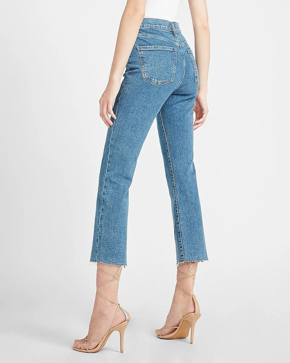 Mid Rise Raw Hem Cropped Flare Jeans in Dark Wash